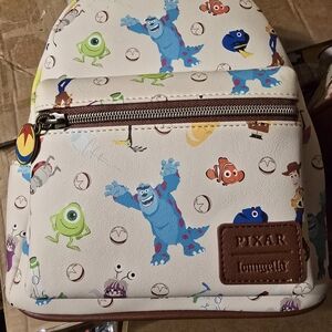 Loungefly Cream Backpack with Colorful Character Design